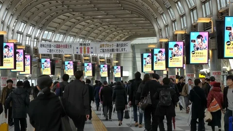Workers commuting to work at the busy Shinagawa Station. Filmed in 4K Stock Footage 109206045