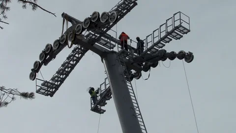 Workers completed installation of multi-ton structure on support. Stock Footage 106799572