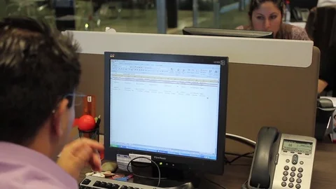 Workers on computers Stock Footage 77046964