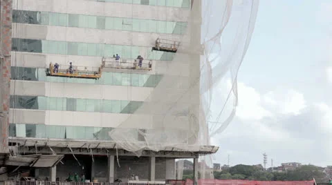 Workers constructing a building wide Stock Footage 27141758