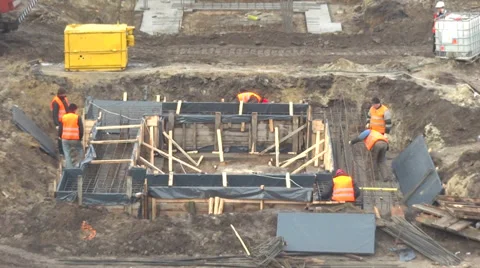Workers at construction area Видео 33379856