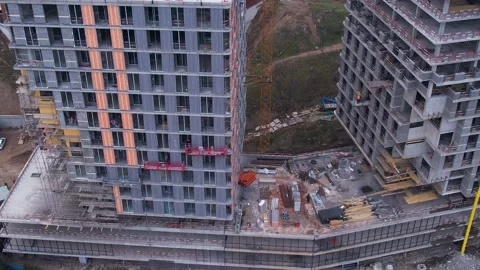 Workers on the construction of a residential complex Stock Footage 169170033