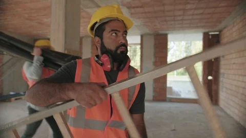 Workers In Construction Site And Building New Home Stock Footage 98287587