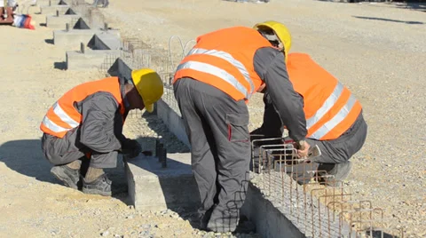 Workers at the construction site and construction tools Stock Footage 32813497