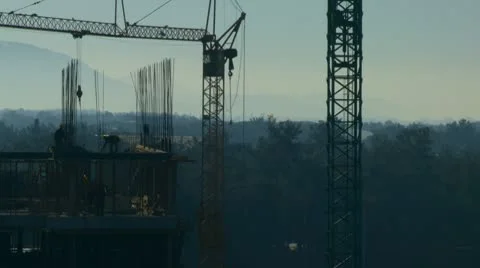 Workers on the construction site early in the morning Stock Footage
