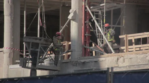 Workers on a construction site Stock Footage 33751709