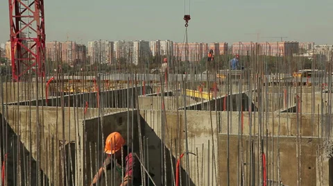 Workers on a construction site Видео 38552519