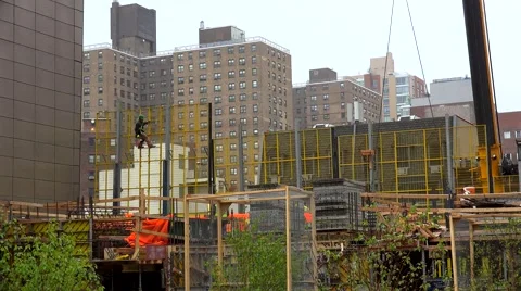 Workers at the construction site from the High Line Park. NYC, New York, USA. Stock Footage 64639031