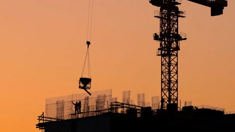 Workers at the construction site knit rebar.  Stock Footage 164337818