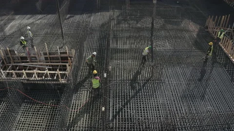 Workers in a construction site pour concrete slabs 스톡 동영상 140756254