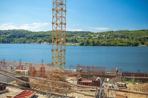 Workers at the construction site. Structural steel beam to build a large Stock Photos