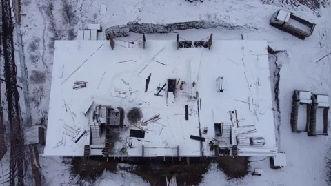 Workers on the construction on a snowy day Stock-Footage 231032457