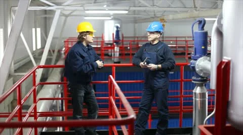 Workers control devices in a Heating Plant Video stock 24651884