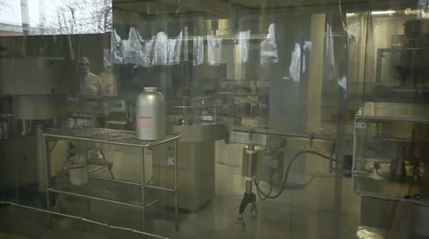 Workers control the operation of the machine for the tablets of drugs Stock Footage 36647388