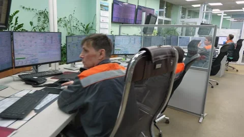 Workers at the control panel in production Stockbeeldmateriaal 294972124