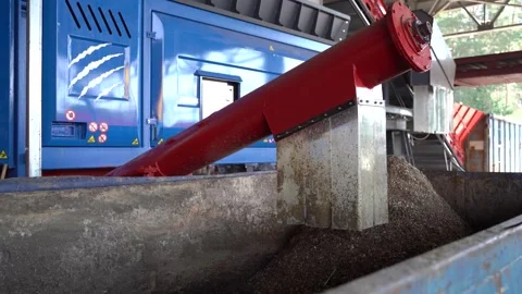 Workers on the conveyor of the waste processing plant Video stock 243888641
