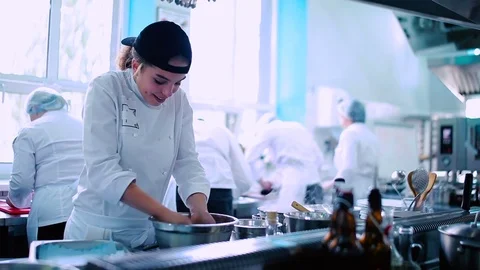 The workers cooking at the kitchen restaurant Stock Footage