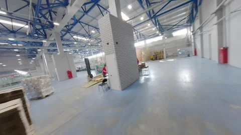 Workers craft cardboard packaging using paper material FPV Stock Footage 290525067