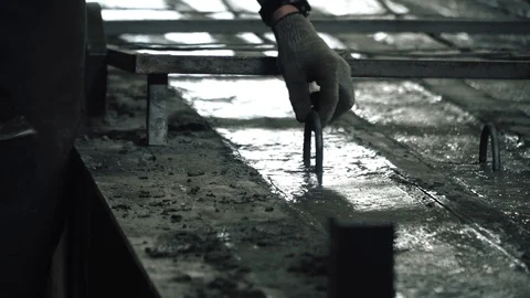 Workers create concrete pillars to current electricity Stock Footage 127684864