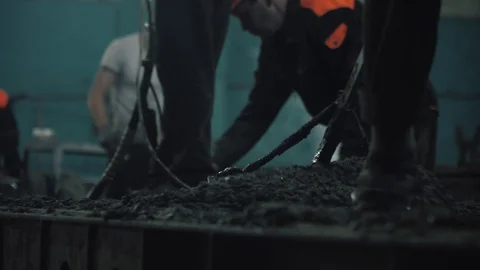 Workers create concrete pillars to current electricity Stock Footage 127685064