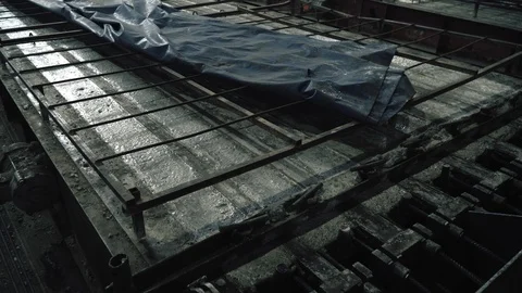 Workers create concrete pillars to current electricity Stock Footage 127689791