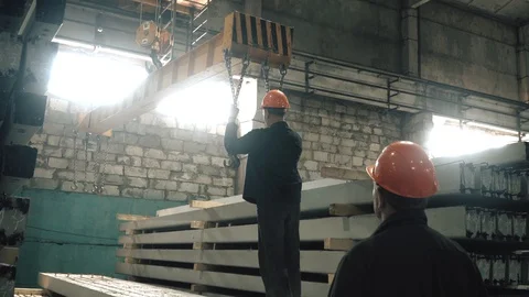 Workers create concrete pillars to current electricity Stock Footage 127690860