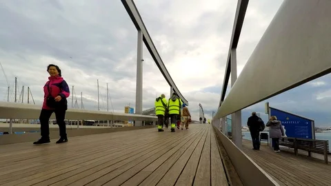 Workers Cross A Modern Bridge Stock Footage 90335355
