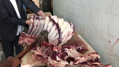 Workers Cut Meat Stock Footage 75594512