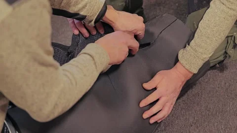 Workers Cutting HVAC Foam Insulation During Professional Duct Installation Stock Footage 340820918