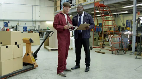 Workers in delivery warehouse factory 스톡 동영상 32932951