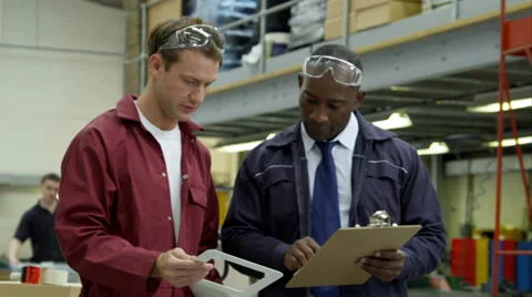 Workers in delivery warehouse factory Stock Footage 32932965