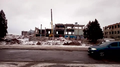 Workers demolish buildings Stock Footage 169795693