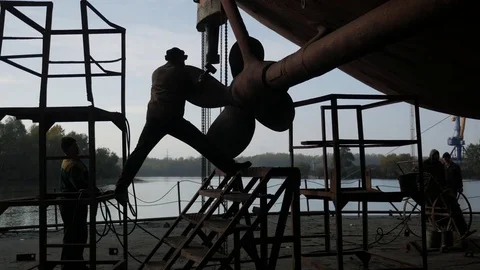 Workers demonethe screw on the ship Stock Footage 82874508
