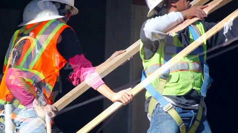 Workers detach a structural element at construction site Stock Footage 34373368