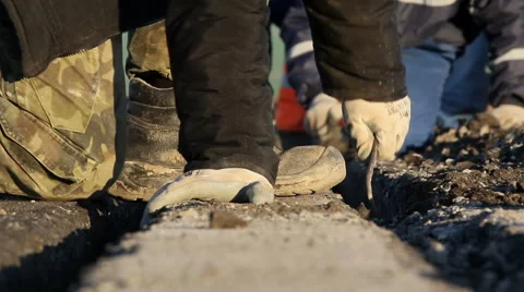 Workers dig trenches to lay cables for the airfield lighting system Stock Footage 57945227