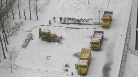 Workers digging a ditch to lay a cable on a winter day Stock Footage 64815629