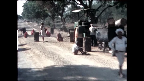 Workers on a Dirt Road Stock Footage 277976236