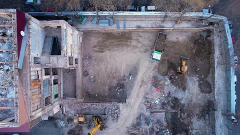 Workers dismantling the building Stock Footage 244897704