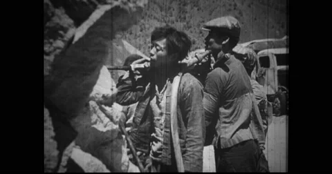 Workers drilling while repairing Burma road Stock Footage