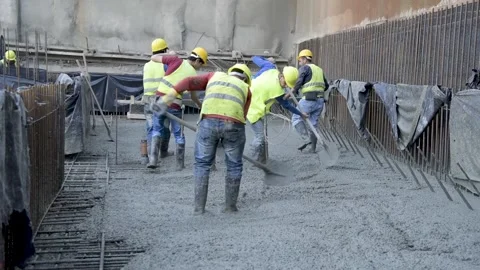 Workers during pouring concrete Stock Footage 152421419