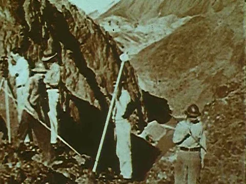 Workers dynamite and excavate and change the course of the Colorado River into Stock Footage 79458464
