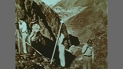 Workers dynamite and excavate and change the course of the Colorado River into Stock Footage 88706819