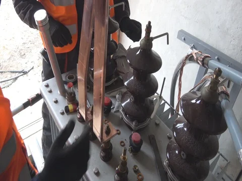 Workers in the electric power station site Stock Footage