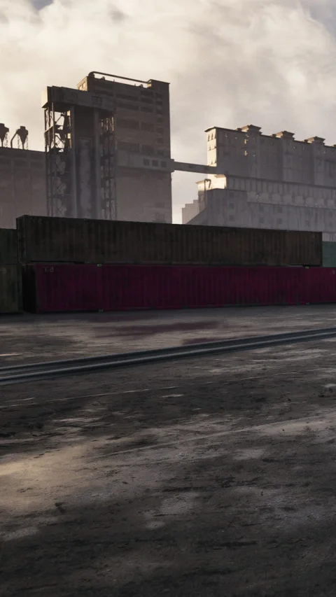 Workers engage in loading tasks at a shipping yard in the early morning light Vídeos de archivo 342176199