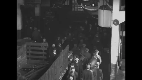 Workers enter and leave the automobile factory - 1939 Stock Footage 103597271