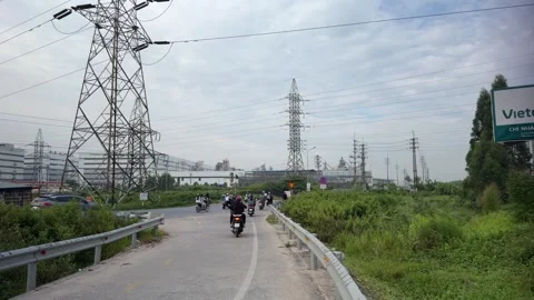Workers-entering-bac-ninh-industrial-zone-morning-commute Stock Footage 340471880