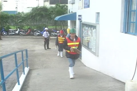 Workers entering the factory Stock Footage 129247