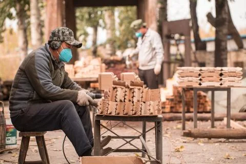 Workers with a face mask Stock Photos