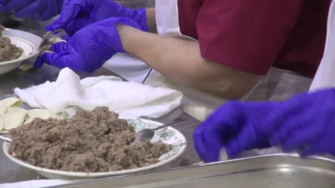 Workers at the factory make dumplings Stock Footage 297194544