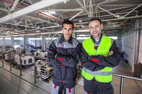 Workers in factory Stock Photos